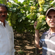 Sagar Bhansali (right) with a farmer who uses the product Biosat